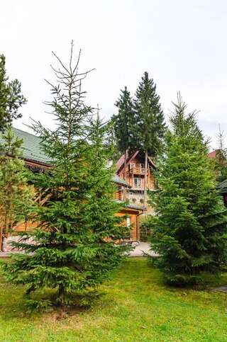 Шале Bukovynskiy Zatyshok Chalet Буковель Шале с 3 спальнями-103